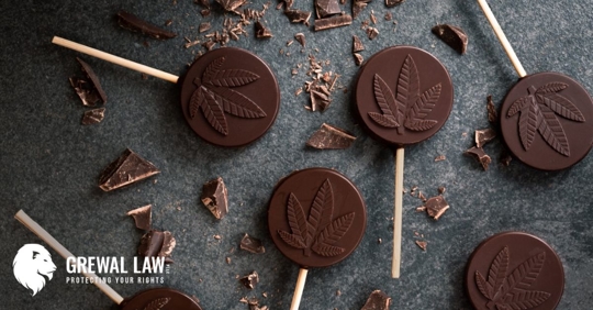chocolate pops with an imprint of a cannabis leaf