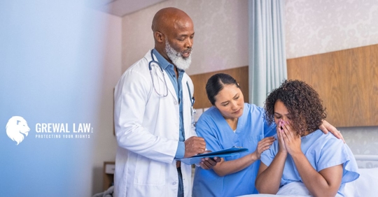 Doctor and nurse comforting patient