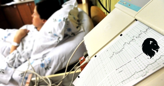 Woman laying down in hospital bed