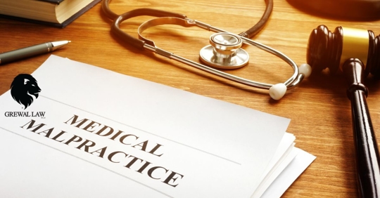 Grewal Law: Documents that say "medical malpractice" with a gavel and stethoscope.