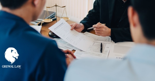 Grewal Law: Clients having a consultation with an attorney.