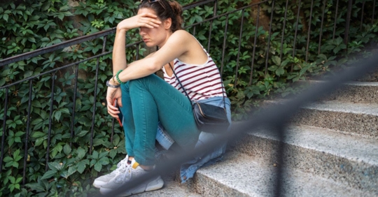 young woman feeling sad and alone