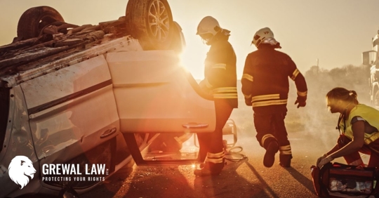 Car rolled onto its roof and paramedics attending  to the scene