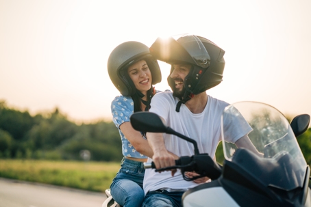 couple enjoying motorcycle ride